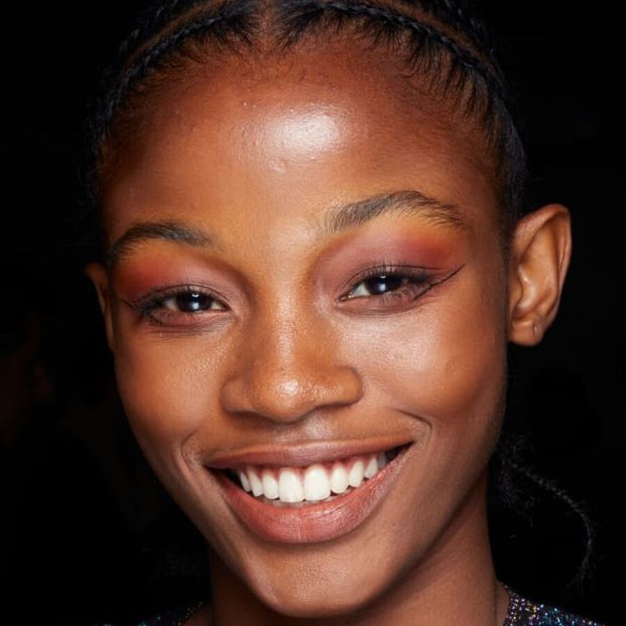 Game-Changing Summer Makeup Tips For Darker Skin Tones